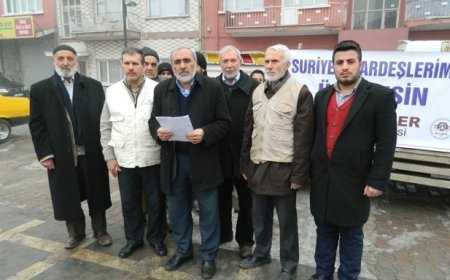 SURİYELİLERE KÖMÜR YARDIMI